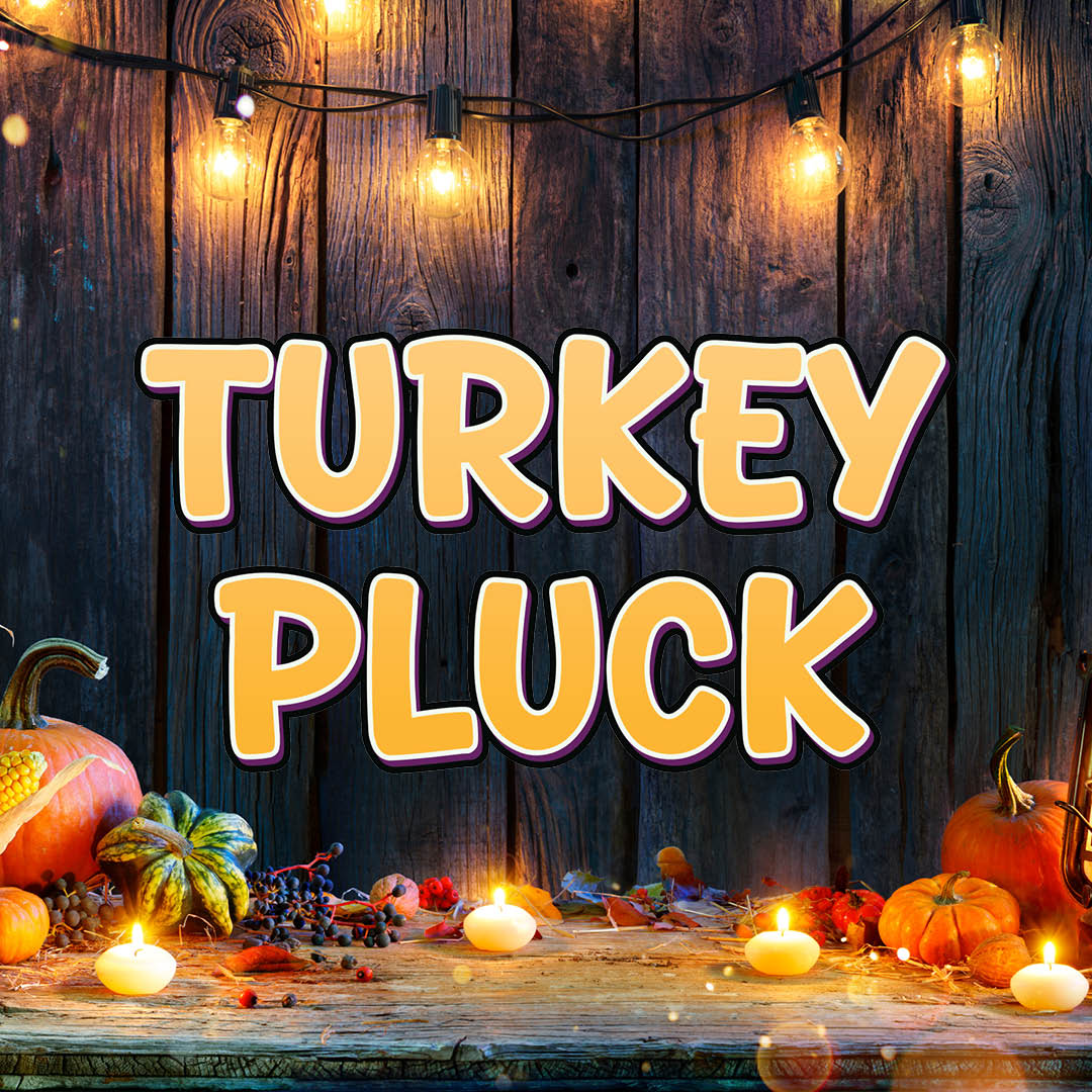 a group of pumpkins and candles on a table