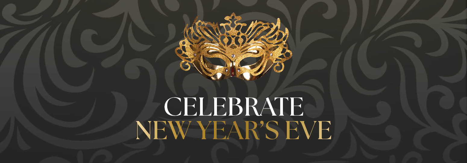 a gold mask on a black background