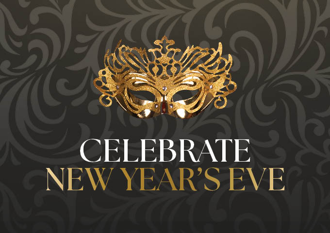 a gold mask on a black background