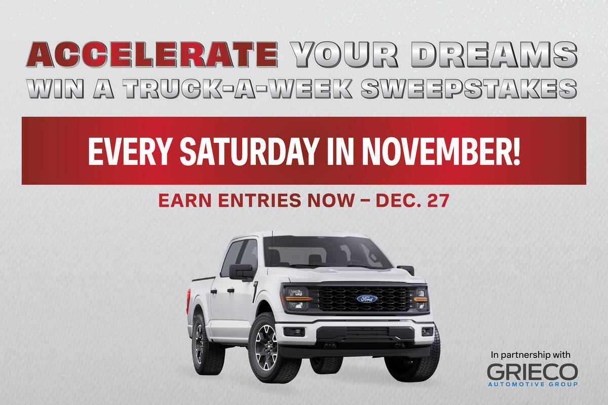 a white truck with red text